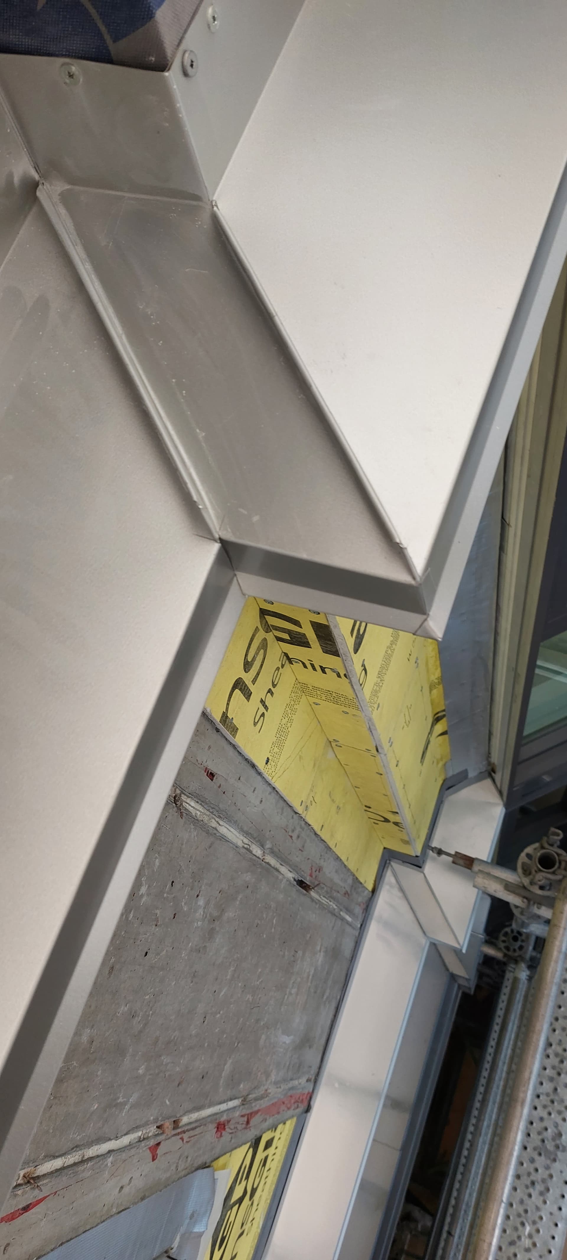 Step flashing along roof-wall intersection by Tomron Construction in Maple Ridge, BC